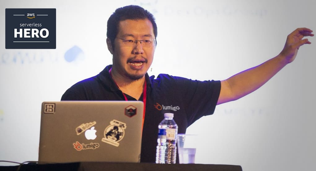 AWS Serverless Hero Yan Cui speaking at a conference